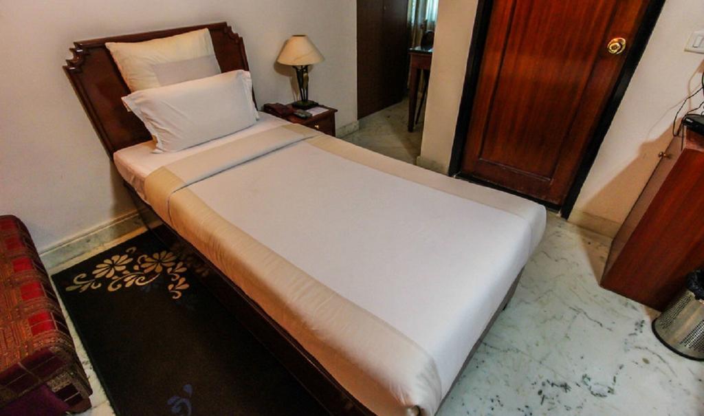 Hotel Pigeon International Bengaluru Pokój zdjęcie