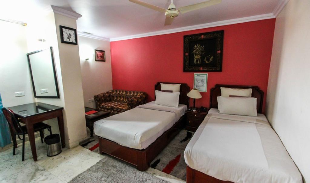 Hotel Pigeon International Bengaluru Pokój zdjęcie